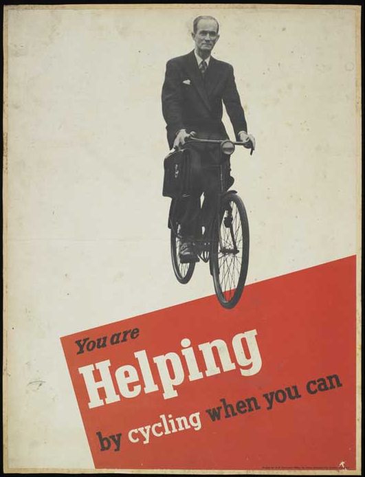 Ты помогаешь, передвигаясь на велосипеде. Вероятно, плакат призывает экономить бензин, нужный для фронта